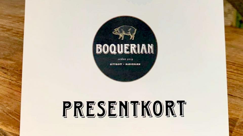 Bild på presentkort med Boquerians restaurang i bakgrunden